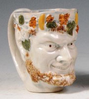 Lot 70 - An early 19th century Prattware Bacchus...