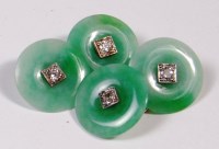 Lot 207 - A pair of early 20th century gents jade and...