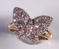 Lot 220 - A modern 9ct gold diamond set butterfly ring,...
