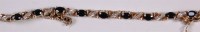 Lot 222 - A modern 9ct gold, sapphire and diamond line...