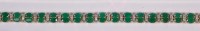 Lot 225 - A contemporary 9ct gold, emerald and diamond...