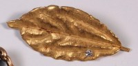 Lot 240 - A contemporary Grima 18ct gold leaf brooch,...