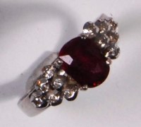 Lot 245 - A contemporary white gold, ruby and diamond...