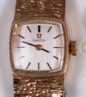 Lot 247 - An Omega 9ct gold ladies dress watch, having a...