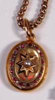 Lot 262 - A yellow gold ruby and diamond set oval...
