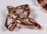 Lot 263 - A 9ct gold and ruby set Art Nouveau style...