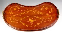 Lot 288 - A Sheraton Revival mahogany and inlaid kidney...