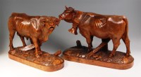 Lot 290 - A pair of Swiss early 20th century carved...