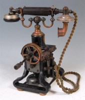 Lot 352 - An early 20th century telephone, with winding...