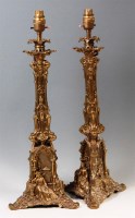 Lot 355 - A pair of Continental gilt brass table lamps,...