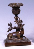 Lot 363 - A circa 1900 bronze candelabrum modelled as a...