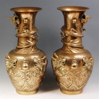 Lot 389 - A pair of circa 1900 Chinese brass vases, each...