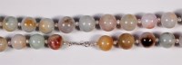 Lot 406 - A Chinese beaded jade and seed pearl necklace,...