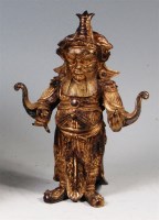 Lot 415 - A Chinese gilt bronze figure of a standing...