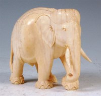 Lot 416 - A 19th century Indian carved ivory elephant in...