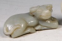 Lot 418 - A Chinese carved jade ox, in recumbent pose, 7....