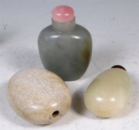 Lot 422 - Three Chinese jade snuff bottles, two...