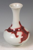 Lot 440 - A Chinese flambé bottle vase, decorated with a...