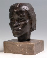 Lot 309 - A 20th century bronze bust of an African woman,...