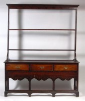 Lot 554 - An 18th century joined fruitwood dresser, the...