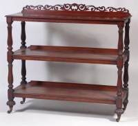 Lot 559 - A William IV mahogany three tier buffet, each...