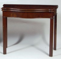 Lot 563 - A George III mahogany serpentine front tea...