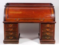 Lot 566 - A late Victorian walnut twin pedestal cylinder...