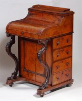 Lot 569 - A Victorian figured walnut piano-top Davenport,...