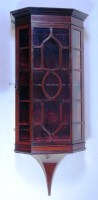 Lot 574 - An Edwardian mahogany hanging pier cabinet,...