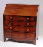 Lot 575 - A circa 1830 mahogany writing bureau, having a...