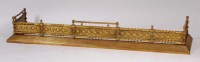 Lot 583 - An Edwardian brass fire fender, of good size,...