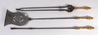 Lot 585 - A late Georgian steel three piece companion...