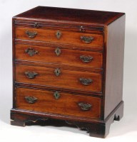 Lot 591 - An early George III mahogany chest, of small...
