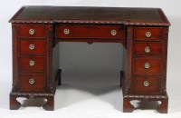 Lot 593 - A Georgian style mahogany inverted kneehole...