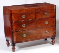 Lot 594 - A George IV mahogany bowfront chest, of two...