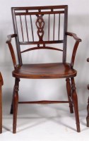 Lot 613 - An early 19th century elmseat and fruitwood...