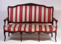 Lot 622 - A Louis XV style beechwood settee, having...