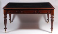 Lot 628 - A Regency style mahogany library table, having...