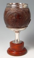 Lot 279 - An 18th century silver mounted carved coconut...