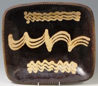 Lot 74 - A 19th century English slipware rectangular...
