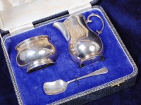 Lot 139 - A modern cased silver three piece christening...
