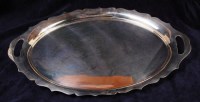 Lot 188 - A Walker & Hall silver twin handled oval...