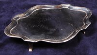 Lot 191 - A George III silver teapot stand, of shaped...