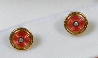 Lot 215 - A pair of Fabergé 18ct gold ear studs, each...