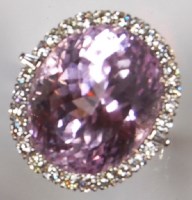 Lot 219 - An 18ct white gold kunzite and diamond dress...