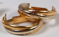 Lot 237 - A pair of Cartier 18ct two-colour gold gents...