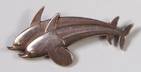 Lot 248 - A Georg Jensen silver brooch, modelled as twin...