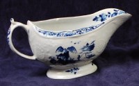 Lot 91 - A circa 1760 Worcester porcelain sauceboat,...
