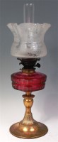 Lot 700 - A Victorian lacquered brass pedestal oil lamp,...