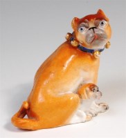 Lot 446 - A Meissen porcelain model of a pug dog with...